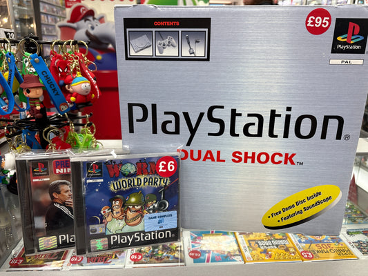 Boxed PS1 with games